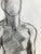 Large charcoal figure drawn from life on 18" x 24" off white newsprint. Subtle tones of black, white and grey. Would look...