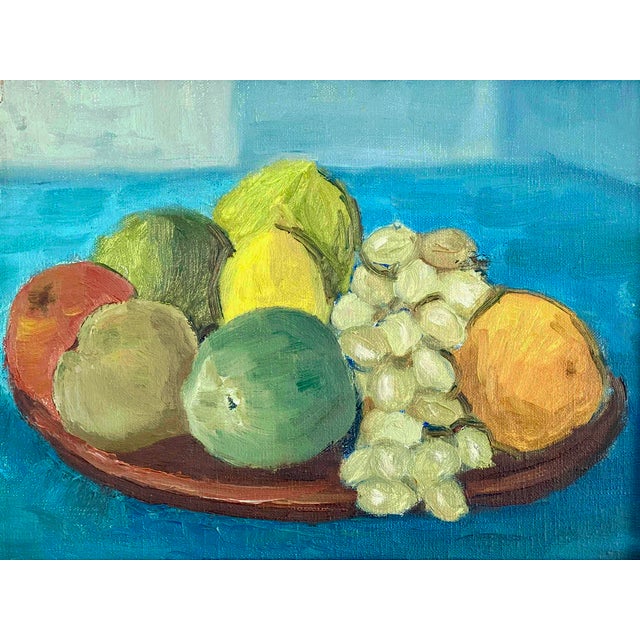 Colorful fruits pop against a vivid blue background in this mid-century Danish Still Life. Painted in the 1950's, it is...