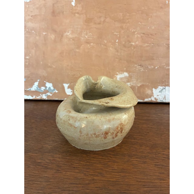 Vintage small scale decorative pottery piece. This unique ceramic table top accessory features gorgeous curvy lines...