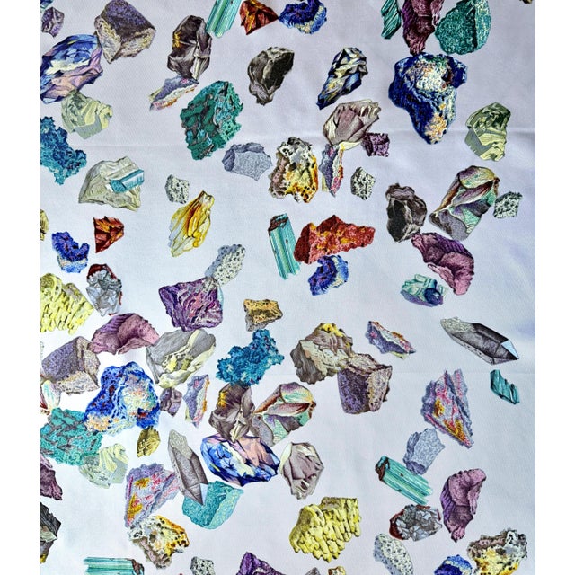 This lovely scarf features a representation of raw gemstones. The formations of emerald, amethyst, and citrine crystals...