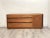 Beautiful mid century modern walnut dresser/credenza with nine spacious drawers manufactured by Dillingham
