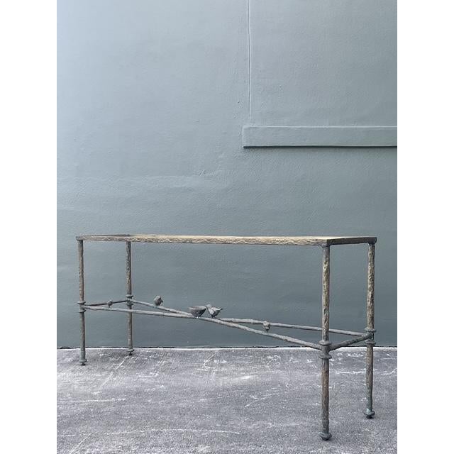 Evoke the sculptural whimsy and organic elegance of Diego Giacometti with this magnificent vintage iron console table. The...