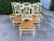 A set of six dining chairs. Each chair has a crème colored frame with a wood seat French Countryside / Cottage Style Sheaf...