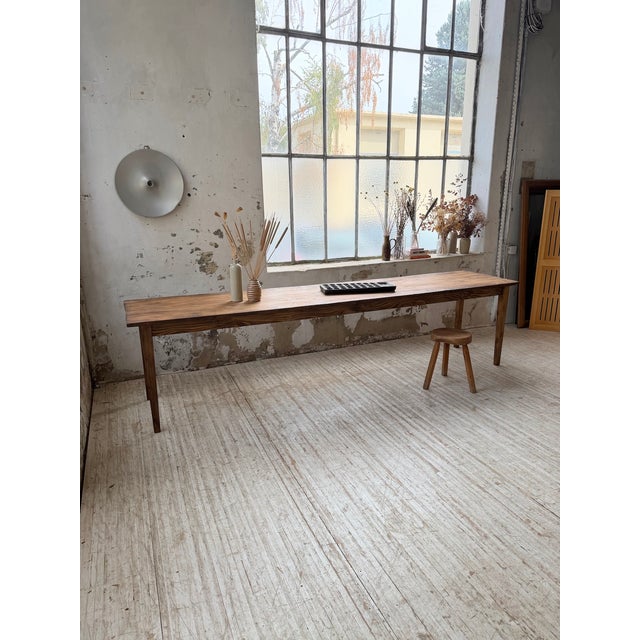 Antique pine farmhouse table with xl dimensions, featuring a 3.1m² top. the top is composed of five planks resting on a...