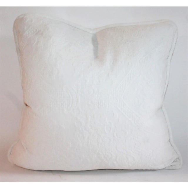 Beautiful double sided floral hand made coverlet textile that has been used to create this beautiful double sided pillow....