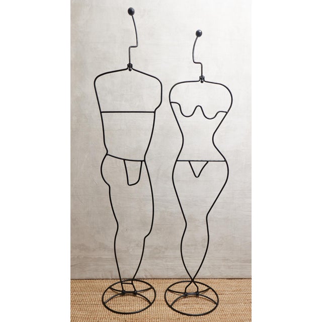 A match made in post-modern heaven! This set of man and woman metal valets is beyond cool. These would make a great retail...
