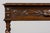 A late 19th-century French oak writing table in the Henry II style, sourced in Provence, France. The table has been...