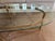 Beveled glass top in good condition, minor chips in small area, brass base has no loss of gold, no breaks, excellent...