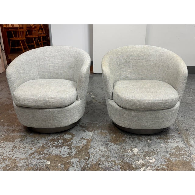 Design Plus Gallery presents a Pair of Jacques Swivel Armchairs by Rodolfo Dordoni for Minotti. These low-profile...