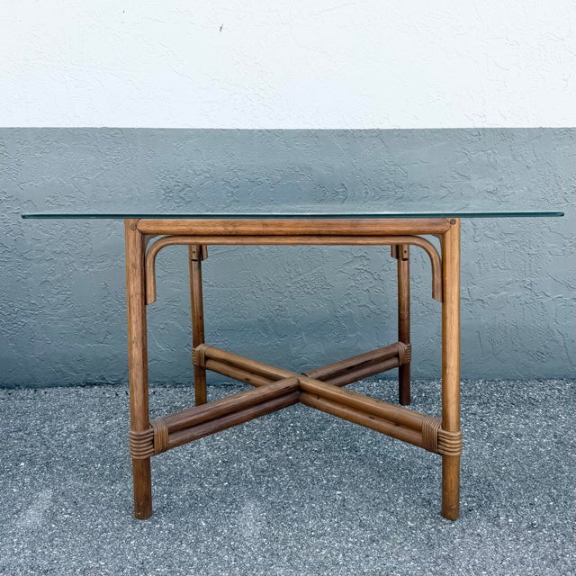 This vintage Boho Chic dining table pairs airy tropical styling with clean architectural lines for a timeless and...