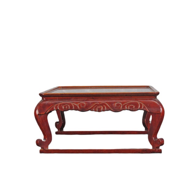 This vintage red tray with legs is a beautiful and functional piece of decor. The tray is a bold red color and comes with...