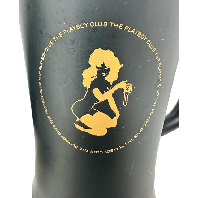A matching set of four vintage 1960s/1970s official The Playboy Club heavy glass tavern beer steins. Representing the peak...