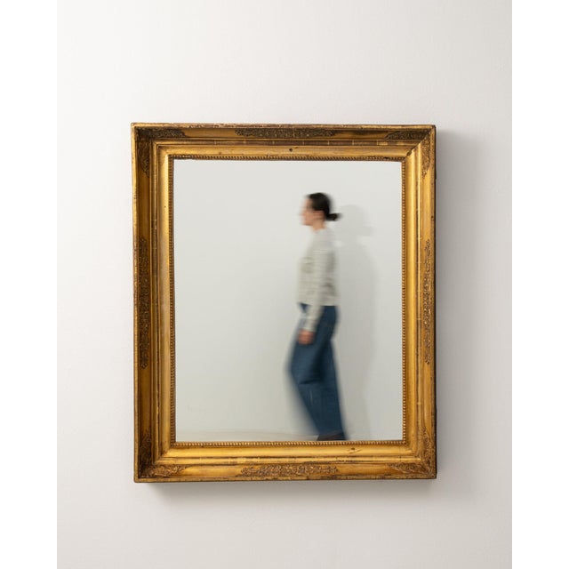 A mirror whose gold gilt frame, rectangular gives it real character at first glance. Dating to 19th Century and...