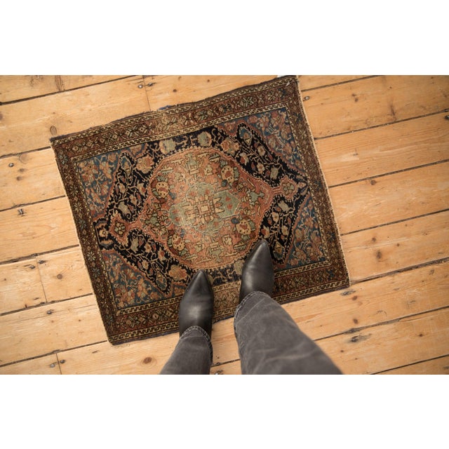 :: Oversized center medallion atop a covered field of delicate vines, blossoms, minor buds, and scrolling tendrils. Minor...