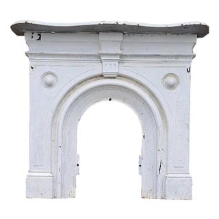 Large Victorian Cast Iron Arched Fireplace with Serpentine Mantel For Sale