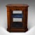 This is an antique jeweller's display cabinet. An English, rosewood and glass shop retail case, dating to the Regency...