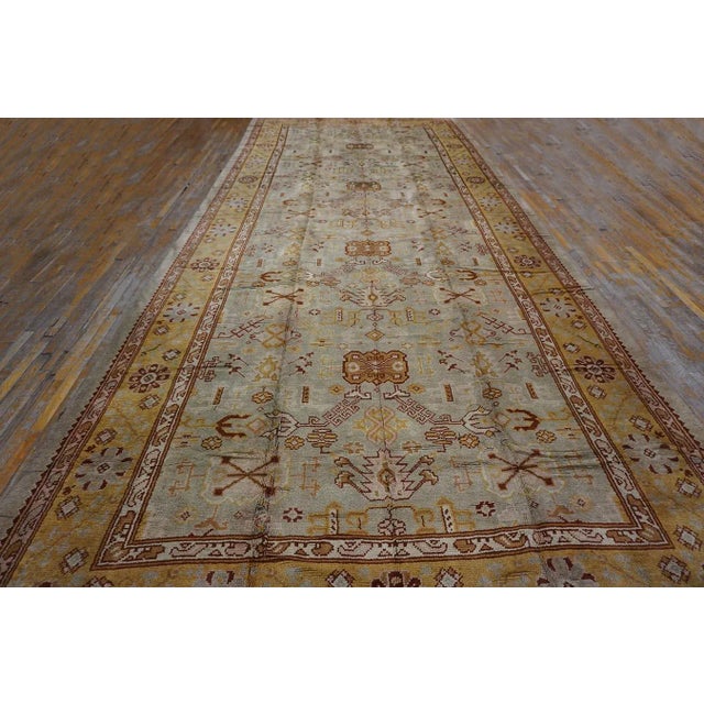 Antique Turkish Oushak Rug, Size: 9' 2" x 22' 4" General Rug Type: Turkish Decorative Specific Rug Type: Oushak Circa:...