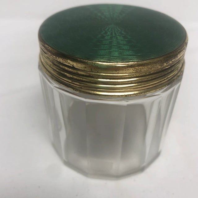 Emerald green guilloche top glass jar.