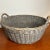 Large vintage wicker basket with gorgeous color and patina. Cloth ring for hanging. Height not including the handles is...