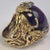 This is a 1960s statement ring featuring a large purple sapphire in an organic Brutalist-style 18K gold setting. On the...