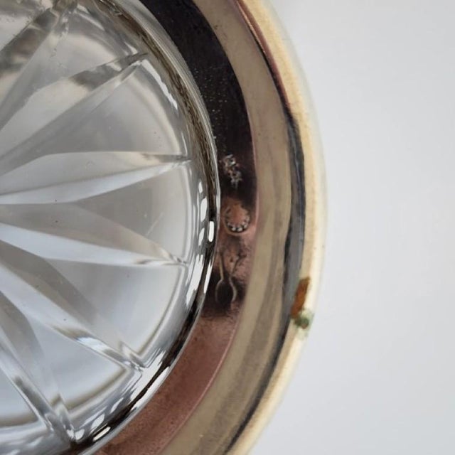 A stunning example of German Historicism by J.D. Schleissner & Söhne. This 1890 jar features an intricate silver repoussé...