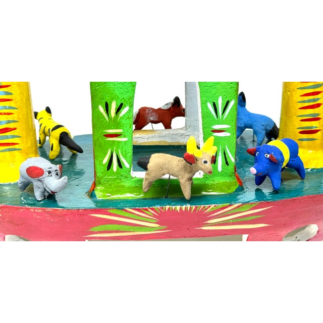 A large colorful ceramic 'Noah's Ark' crafted by Gerardo Ortega who is a master figural ceramist with a style of his own....