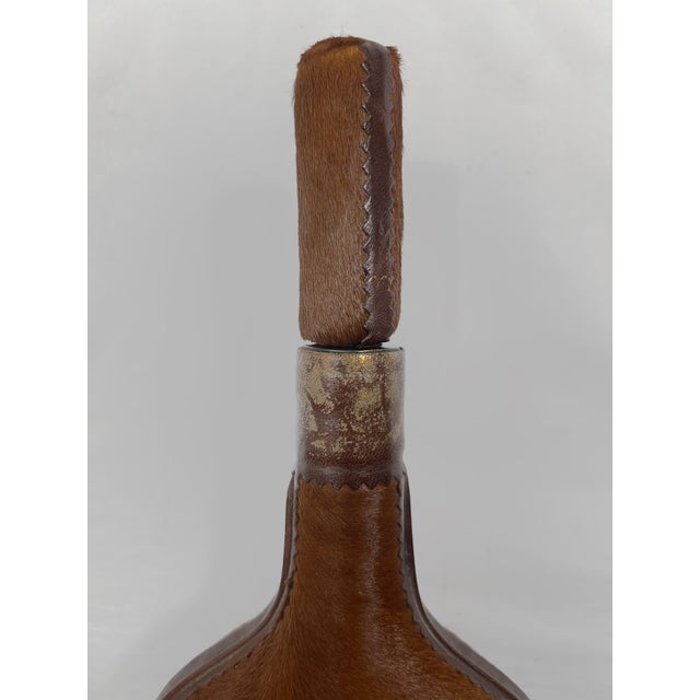 Vintage Hollywood Regency Italian Hair-on-Hide Decorative Decanter With Heraldic Brass Crest For Sale - Image 4 of 7