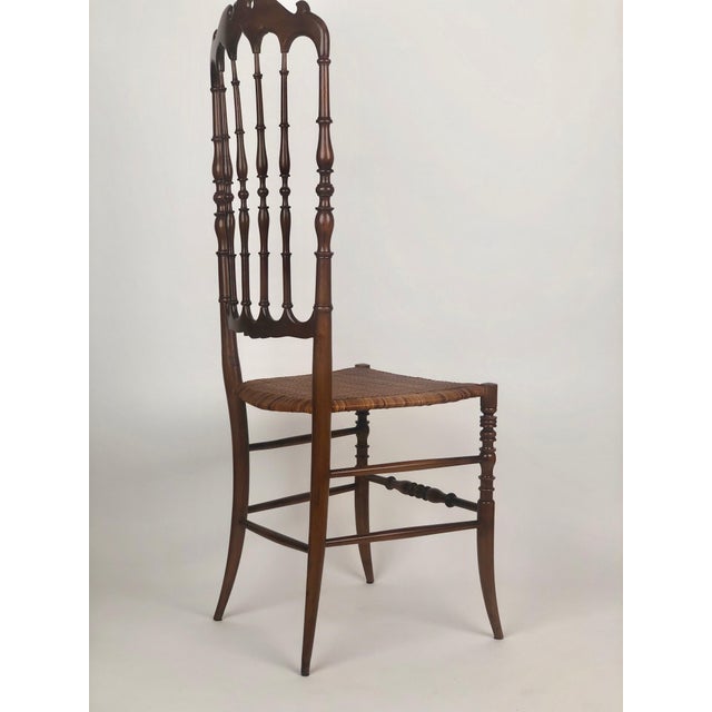 Set of two Chiavari chairs produced in the 1950´s. The chairs have a cane seat in on excellent condition with a high back...