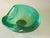 This vide poche or ashtray in in Glass. It has been done circa 1970, in Murano, Italy\. The shape is a free form....