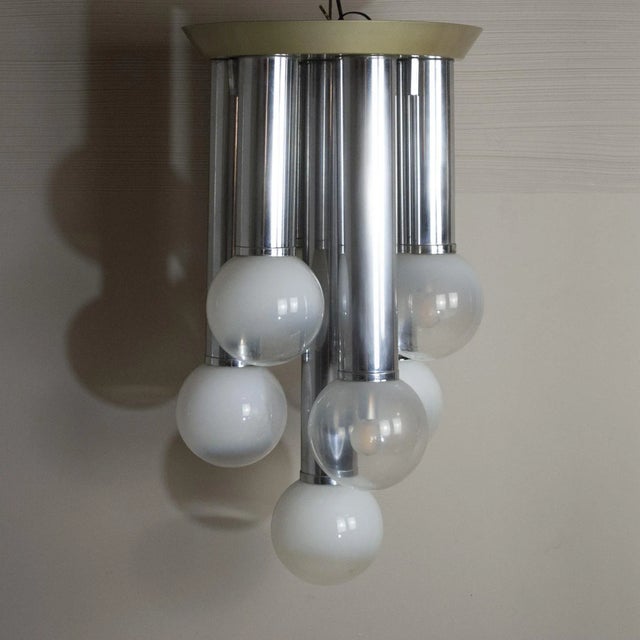 Suspension Chandelier With 7 Lights in Satin Glass, Italy, 1970s, in Good conditions. Designed 1970 to 1979 Up to 250V...