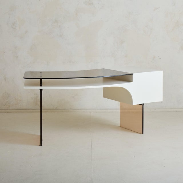 A striking example of mid-century French design, this 1960s curved desk combines a modernist aesthetic with minimalist...