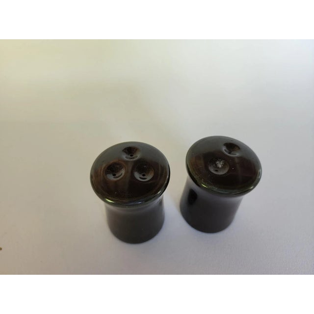 1970's Franciscan Madeira salt and pepper shakers in classic Mid Century Spanish colors and style. Two tones of green on a...