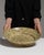 This early 20th century serving piece from France is finished in tan, worked in ceramic. Its signed detailing gives the...