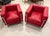 Beautiful and stylish chrome and red leather club chairs in the style of Le Corbusier.