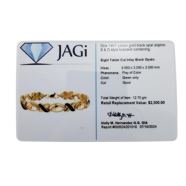 Black Mid 20th Century 14 Karat Yellow Gold & Black Opal Xo Dolphin Bracelet For Sale - Image 8 of 8