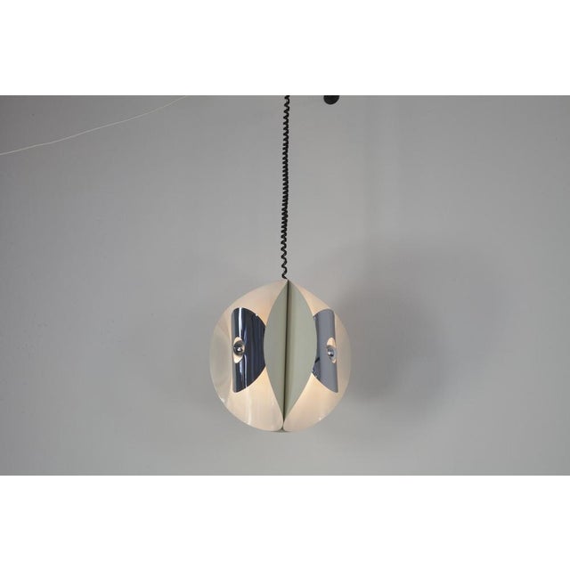 Italian Space Age Hanging Lamp with White Painted, Metal & Chrome Shields, 1970s, in Good conditions. Designed 1960 to...