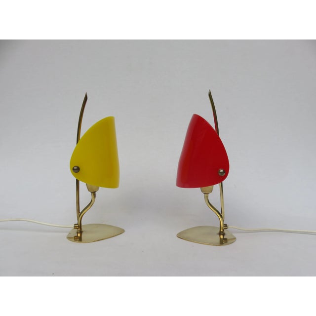 1 Pair of minimalist bedside lamps, small table lamps from the 50s, made in Italy. The bases are brass, the lampshades...