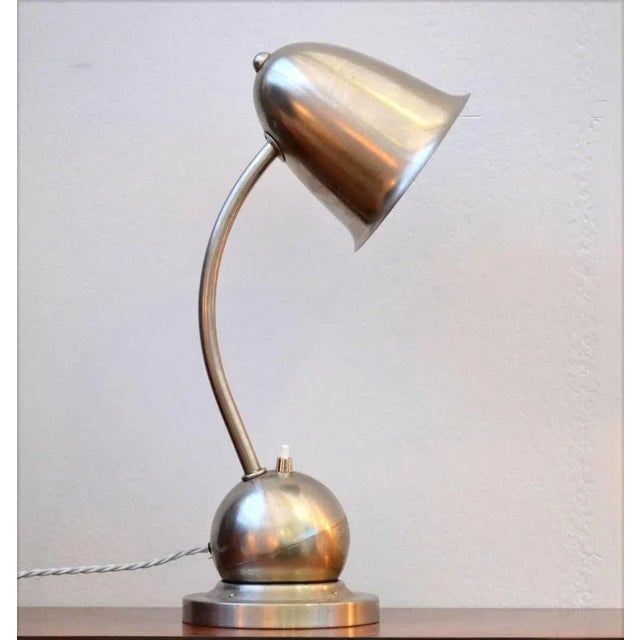 Art Deco table or desk lamps by Daalderop, Giso Holland, 1930s. Nickel-plated lamps are fully adjustable in position; the...