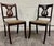 This is a gorgeous pair of vintage, possibly antique, Duncan Phyfe style harp back or lyre back dining chairs, believed to...