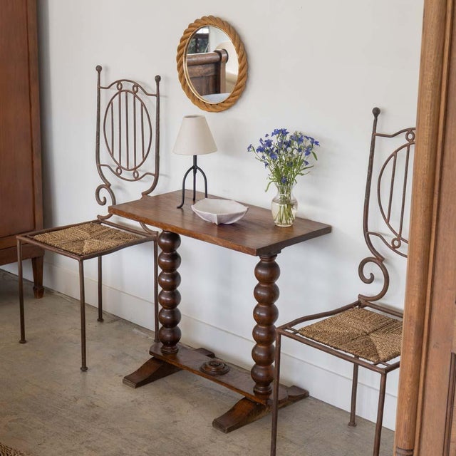 Beautiful dark oak bobbin wood side table in the style of Charles Dudouyt from France, 1940s. Rectangular plank wood top...