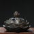 This beautiful piece is masterfully sculpted to resemble a blooming lotus flower, a powerful symbol of purity and...