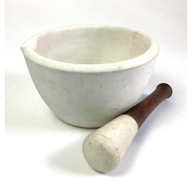 This is an antique mortar and pestle in ceramic apothecary or cookery tool. Victorian period, circa 1900. Beautifully...
