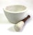 This is an antique mortar and pestle in ceramic apothecary or cookery tool. Victorian period, circa 1900. Beautifully...