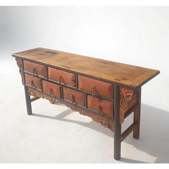 This 19th century 7 drawer cabinet features a distinctive recessed-leg construction with a flush-panel top. The facade is...