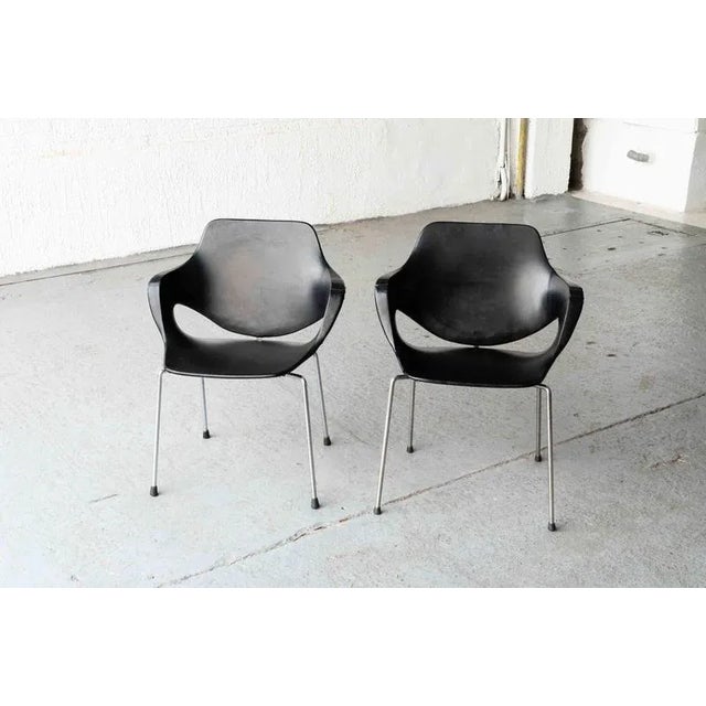 These rare side chairs carry a stamp by the antwerp furniture company straatman, loral & cie and date back to 1960. This...