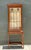 This vintage mahogany glass display cabinet is a distinguished example of early to mid-20th-century craftsmanship,...