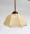 Charming Art Deco glass lamp in a soft beige shade. The colored glass creates a warm and diffused light. The curved and...