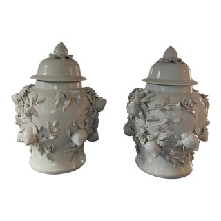 Exceptional Chinese Blanc De Chine Porcelain Ginger Jars With High Relief Peaches and Vines- a Pair For Sale