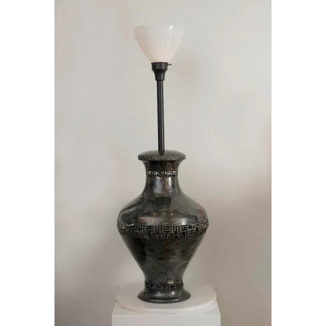 This sculptural and monumental fantastic vintage rare bronze lamp by the noted Italian artist; Marcello Fantoni was done...