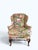 Width: 33.25 inches Height: 49.5 inches Depth: 27.5 inches A beautifully reimagined William & Mary wingback armchair,...